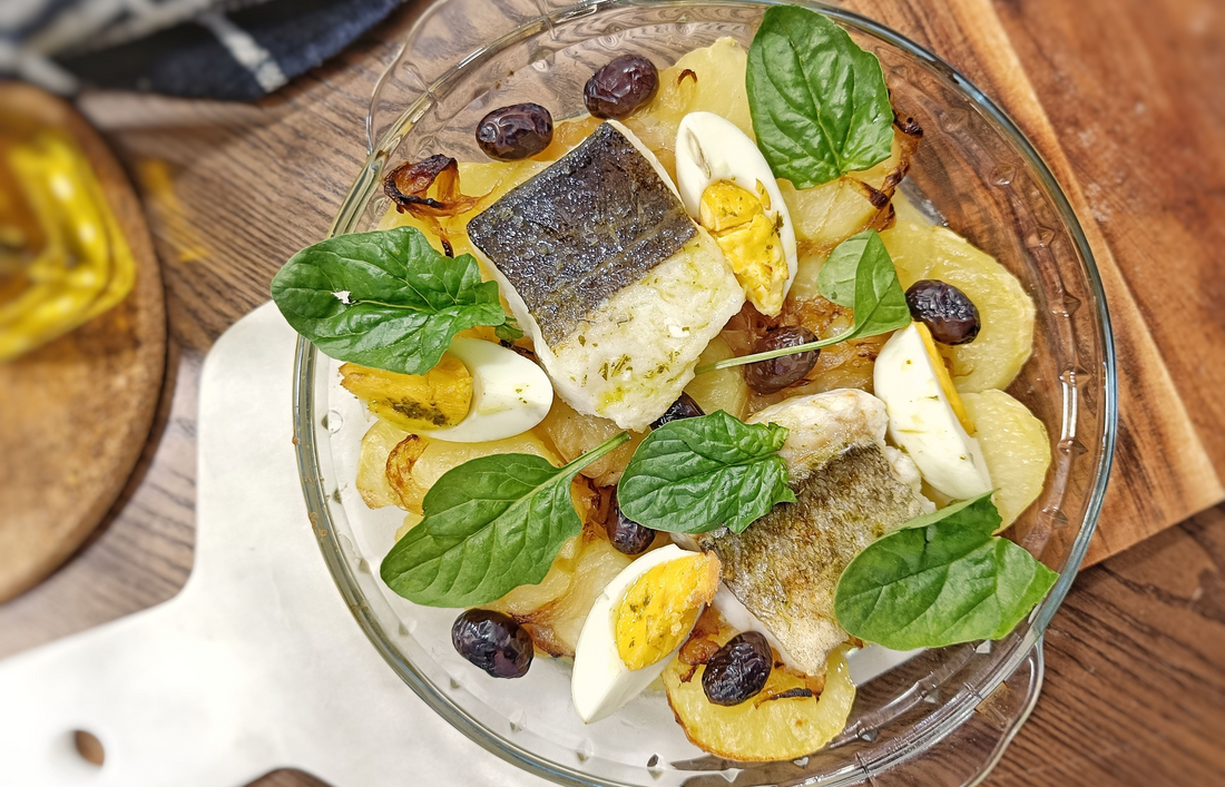 Bacalao asado con patatas y cebolla