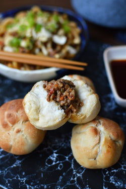 Panecillos orientales rellenos de cerdo y shiitakes